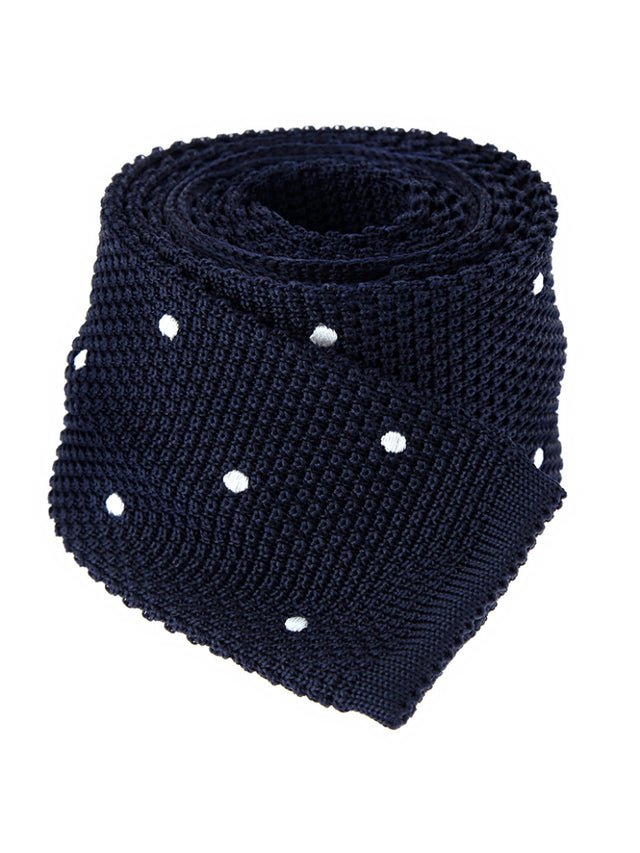 Navy blue silk knit tie with white polka dots