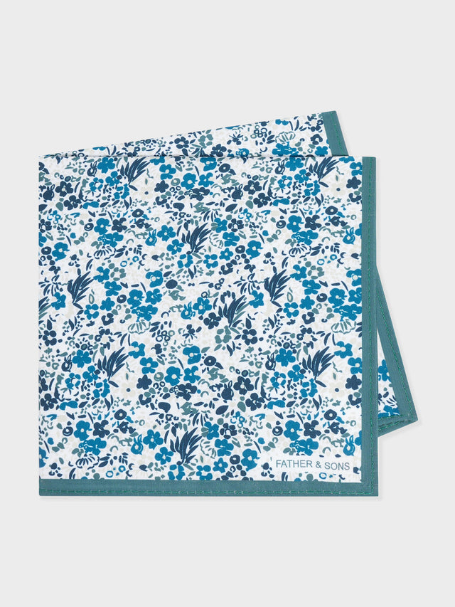 Pochette verte à motif fleuri bleu
