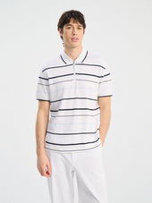 Polo loose en coton blanc à rayures bleues