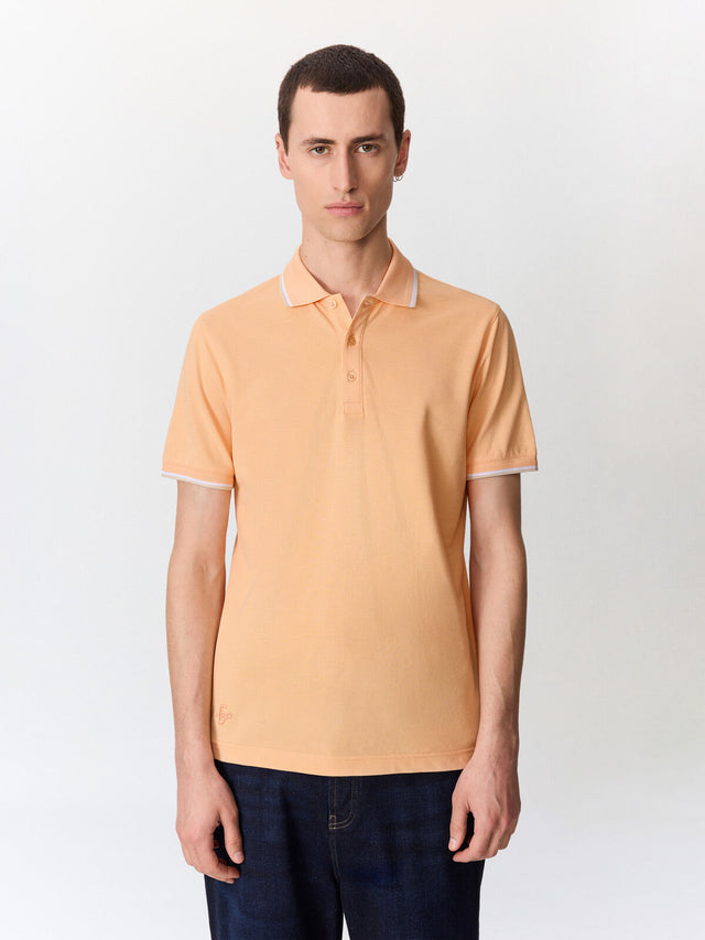 Polo slim en coton pêche