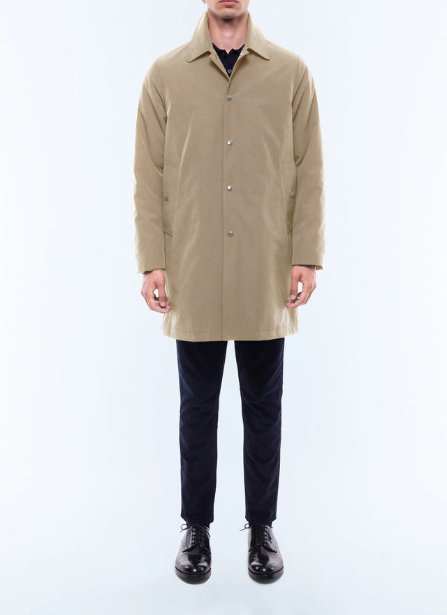 Coat in waterproof fabric