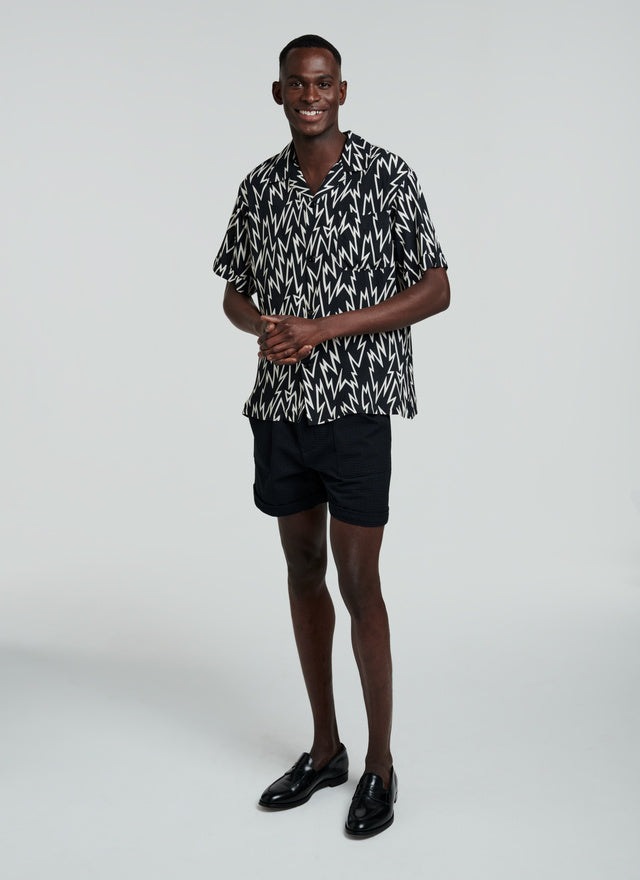 Black short-sleeve shirt with fancy print