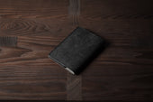 Take Care Passport Case . Black Raw
