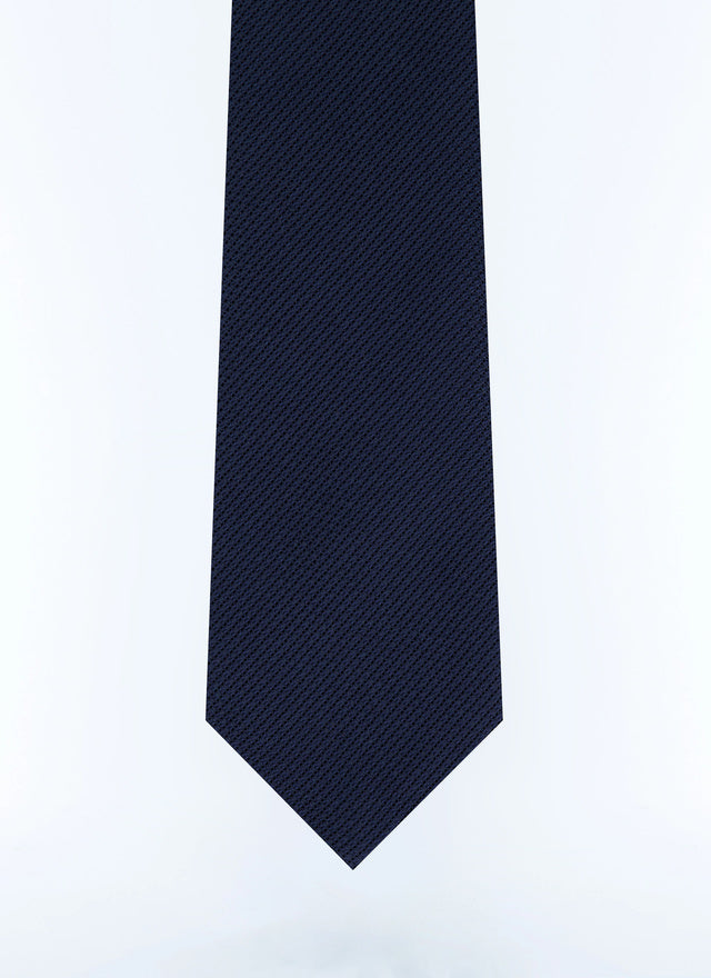 Navy blue silk tie with pattern